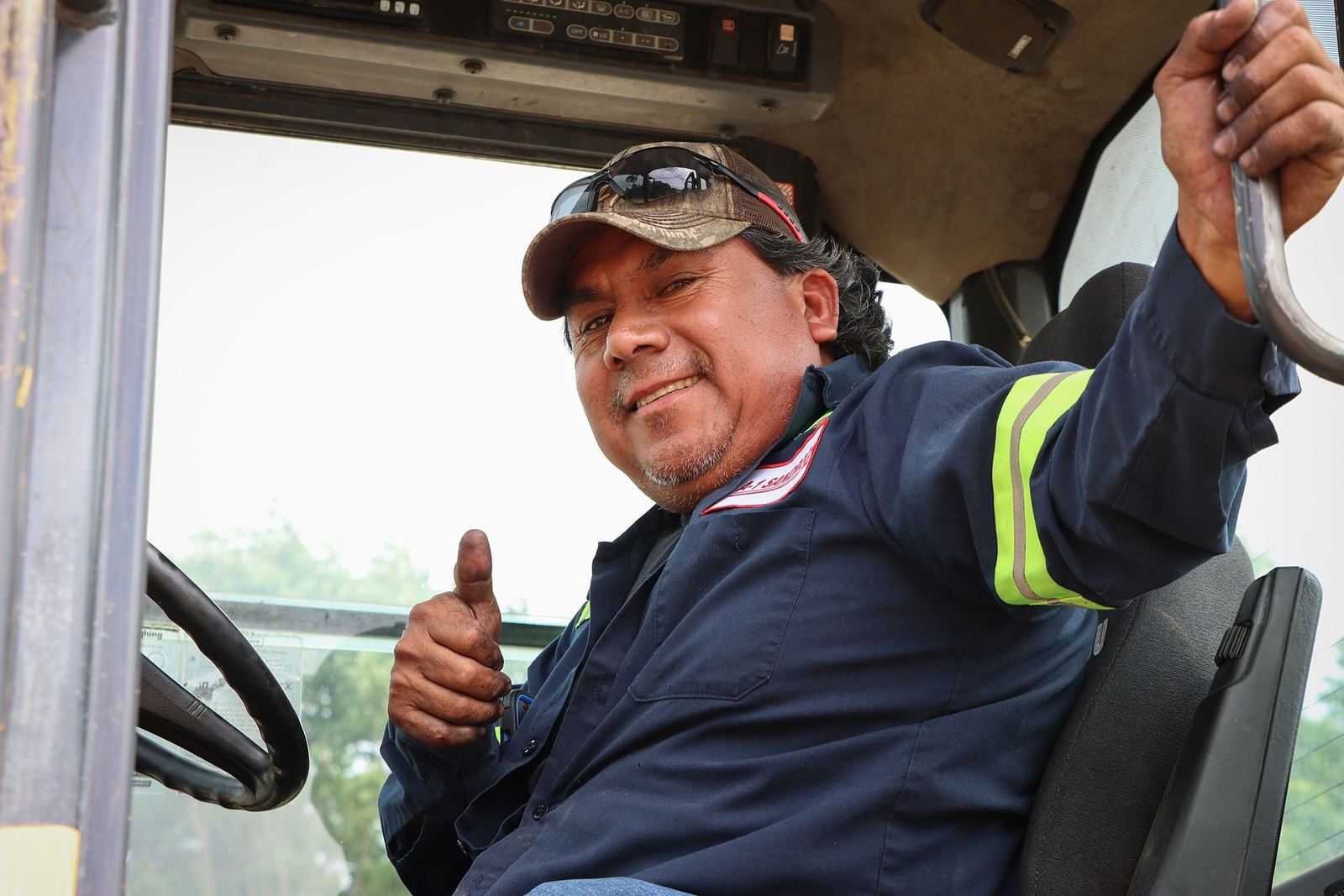 Ray, an A-1 team member since 2009, giving a thumbs up from the cab