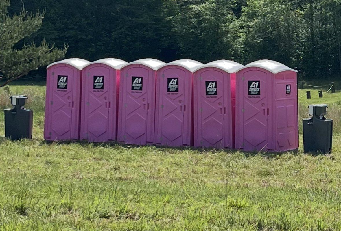 Pink women's units and standard units at an event