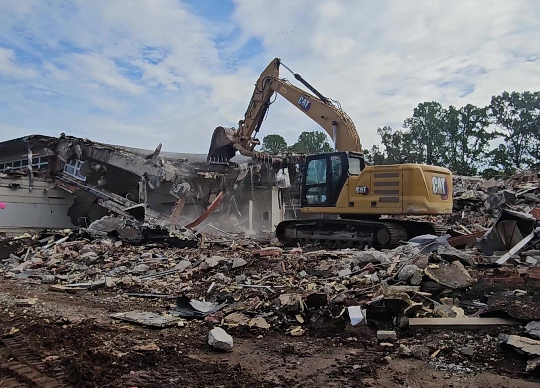 A-1 excavator demolishing the Rural Hall fire station