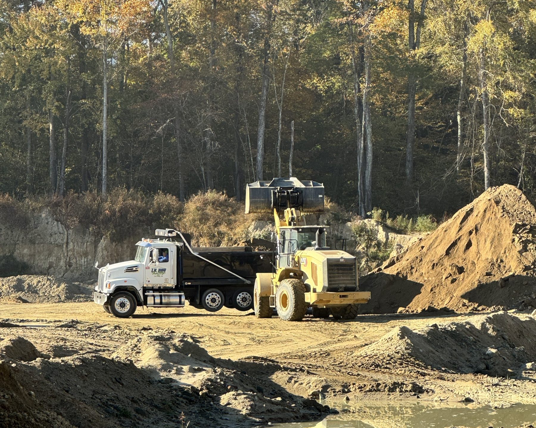A-1 wheel loader filling a customer dump truck with Sandrock at Viewmont Sandrock Pit