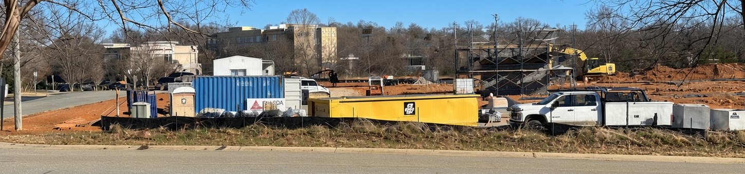 An A-1 roll-off dumpster and portable toilet at a new motel under construction in Mebane, NC