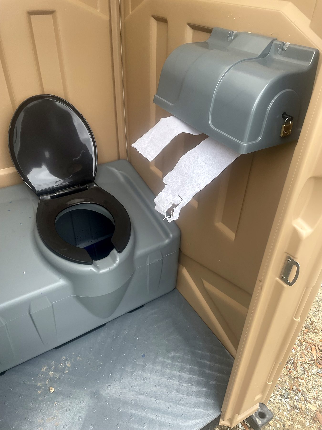 Clean interior of an A-1 portable toilet
