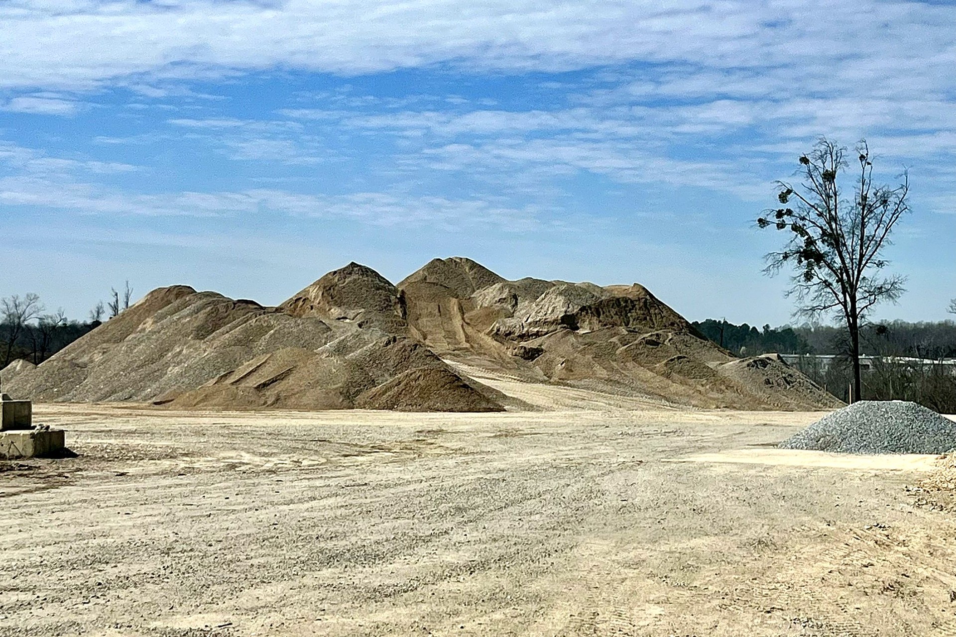 Stockpiles of crushed concrete crusher run (ABC) at an A-1 recycling yard